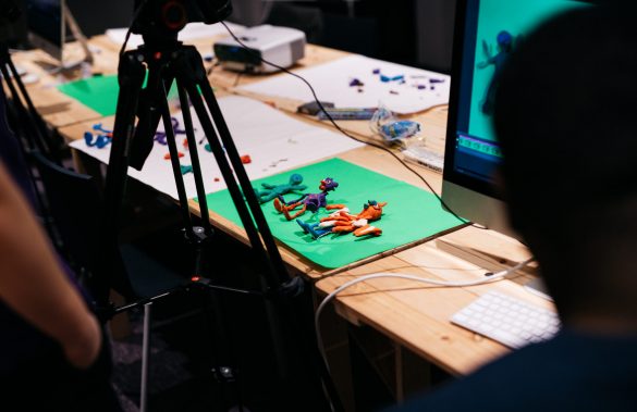 Member of the Mouth That Roars organisation shooting models for their animation piece